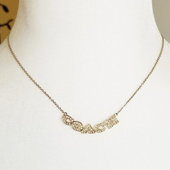 NWT Coach Authentic Pave Pendant Crystal Spellout Gold Tone Collar Necklace